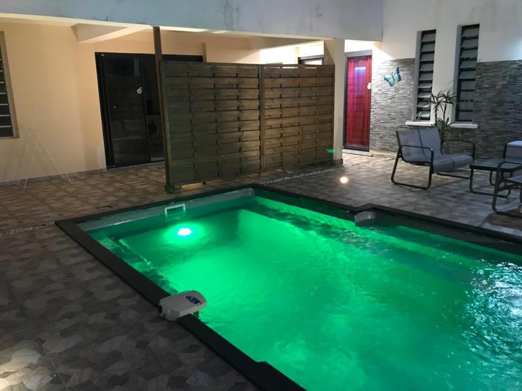 Le Flamboyant Avec Piscine Chauffee 30° Et Jacuzzi Apartment Сен-Андре Екстериор снимка